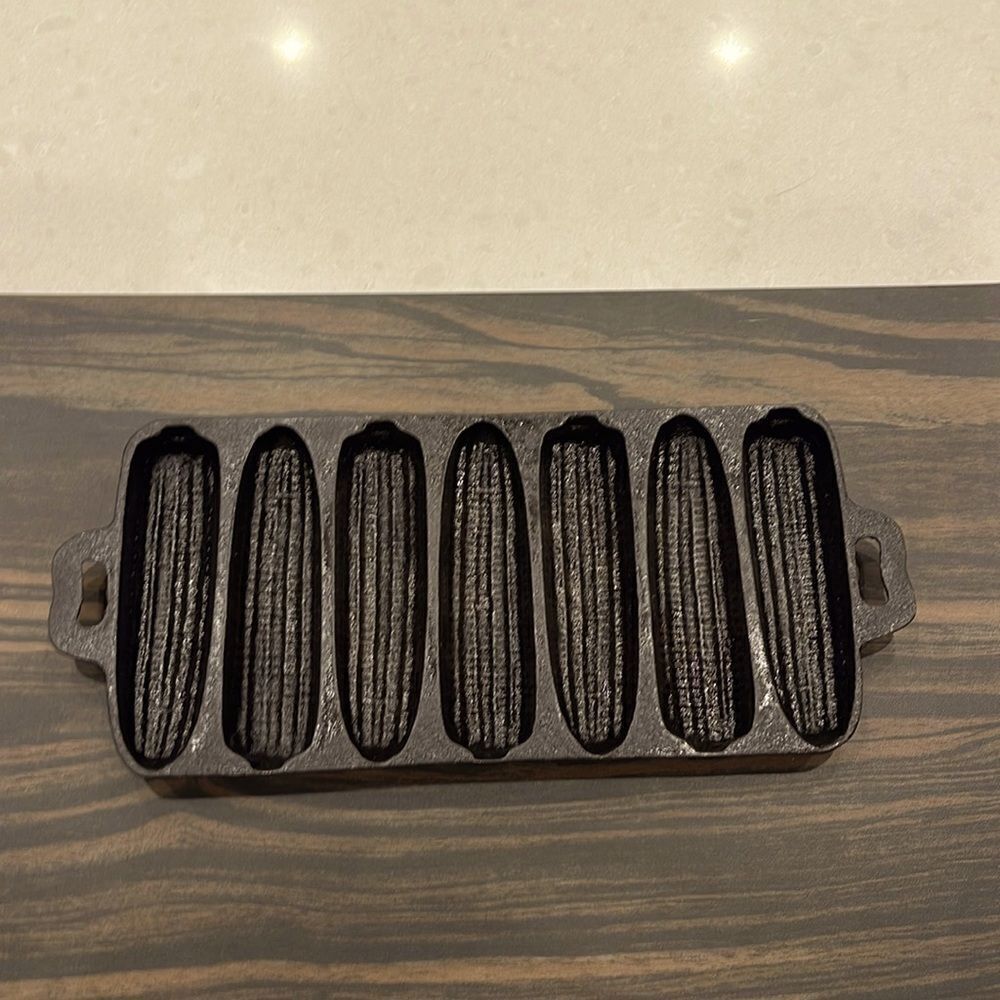 Cast-iron cornbread mold seven loafs  per mold works great. Great for parties.